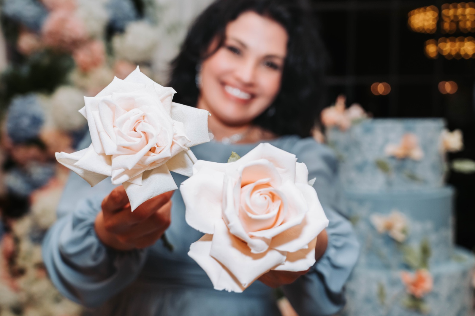 Bride holding a single rose, editorial portrait