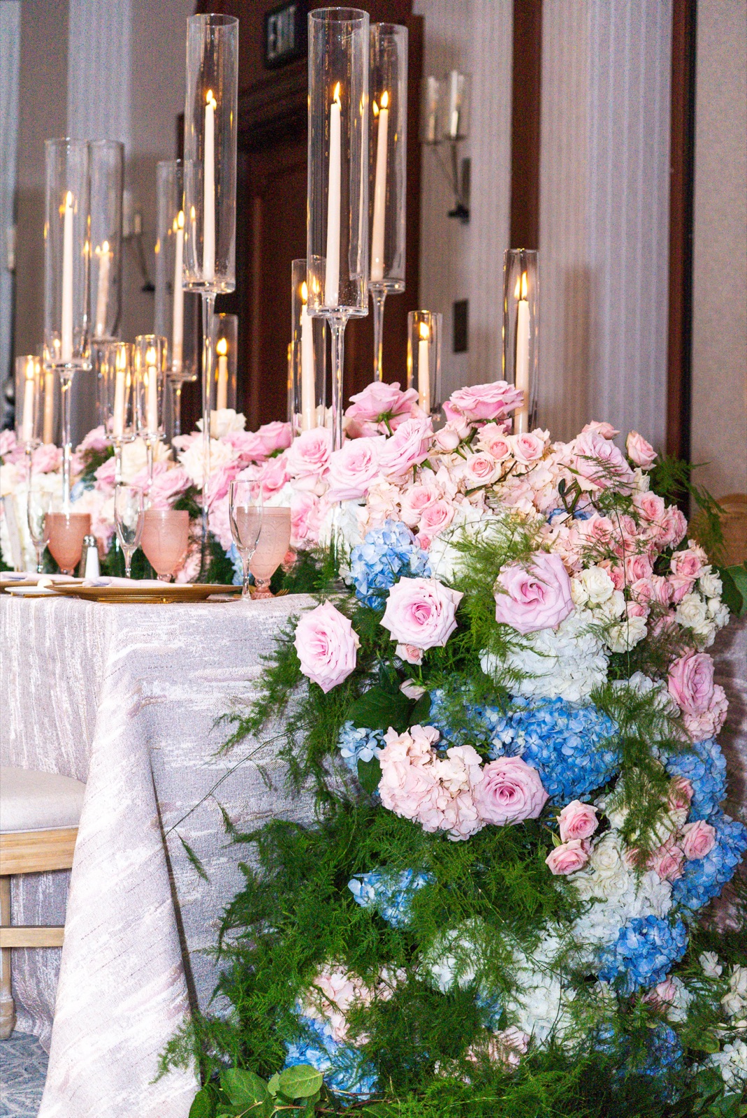 Candlelit floral tablescape detail